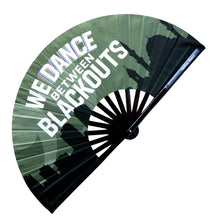Load image into Gallery viewer, We Dance Between Blackouts UV GLOW Hand Fan